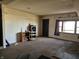 Bright living room featuring a vintage shelving unit and natural light from a window at 21977 Craig Ave, Noblesville, IN 46060