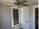 Bedroom with a ceiling fan, a window and a closet at 238 S Main St, Wilkinson, IN 46186