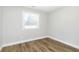 Minimal bedroom featuring white trim and new flooring at 240 E Caven E St, Indianapolis, IN 46225