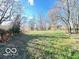 Image featuring the large grassy backyard at 2505 E 17Th St, Indianapolis, IN 46218
