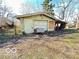 A detached garage with a garage door at 2505 E 17Th St, Indianapolis, IN 46218