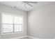 Clean, naturally-lit bedroom with a ceiling fan and neutral paint at 2786 Kipling Dr, Carmel, IN 46033