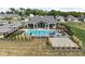 Aerial view showcases the community pool area, featuring lounge chairs, tables, and a pergola at 2786 Kipling Dr, Carmel, IN 46033