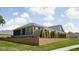 Charming single-story home boasts well-maintained landscaping, a stone foundation, and dark blue siding at 2786 Kipling Dr, Carmel, IN 46033