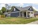 Beautiful home exterior with lush green lawn, charming porch, and well-maintained landscaping at 2786 Kipling Dr, Carmel, IN 46033