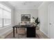 Bright home office with a large desk, neutral decor, and a large window at 2786 Kipling Dr, Carmel, IN 46033