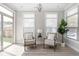 Cozy sitting area with neutral furniture, lots of natural light, and wood-look flooring at 2786 Kipling Dr, Carmel, IN 46033