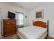 Cozy bedroom with wood furniture, neutral carpet and natural light at 3045 Sholty Ct, Cicero, IN 46034