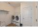 Laundry room featuring a washer, dryer and built in shelving at 3045 Sholty Ct, Cicero, IN 46034