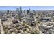 Scenic aerial view showcasing a city skyline and surrounding residential area on a sunny day at 310 E St Clair St, Indianapolis, IN 46202