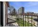 This balcony offers a picturesque view of the city skyline on a sunny day at 310 E St Clair St, Indianapolis, IN 46202