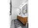 This bathroom features a double vanity with modern sinks and fixtures, and contemporary design at 310 E St Clair St, Indianapolis, IN 46202