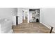Bright bedroom with hardwood floors leading to a closet; offering ample space and storage solutions at 310 E St Clair St, Indianapolis, IN 46202