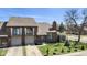 Charming brick townhouse with attached garage, balcony and well-manicured lawn at 310 E St Clair St, Indianapolis, IN 46202