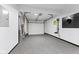 Clean garage with epoxy flooring and ample space for parking and storage at 310 E St Clair St, Indianapolis, IN 46202