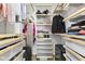 This walk-in closet offers ample storage space with custom shelving and organization solutions at 310 E St Clair St, Indianapolis, IN 46202