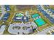 Aerial view showcasing community amenities, parking, pool, clubhouse, and tennis courts at 3121 Arkle Rd, Westfield, IN 46074