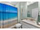Cheerful bathroom with a vanity, granite countertop, and a shower/tub combo at 3121 Arkle Rd, Westfield, IN 46074
