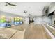 Exercise room with fitness balls, mirrors, ceiling fans, and wood floors at 3121 Arkle Rd, Westfield, IN 46074
