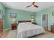 Comfortable main bedroom features light wood floors, an area rug, and en suite bathroom access at 3121 Arkle Rd, Westfield, IN 46074