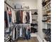 Walk-in closet with ample shelving and rods for organized storage of clothing and shoes at 3345 Ruckle St, Indianapolis, IN 46205