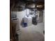 Basement laundry area featuring a modern washer, dryer, and utility sink at 3422 Hillside Ave, Indianapolis, IN 46218