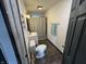 This charming bathroom features a sleek vanity, shower with curtain, and modern fixtures at 3422 Hillside Ave, Indianapolis, IN 46218