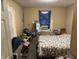 Bedroom with some furnishings and decor, offering a comfortable space for relaxation and personalization at 3422 Hillside Ave, Indianapolis, IN 46218