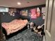 Stylish bedroom with vibrant decor, cozy bedding, and ample space for relaxation at 3422 Hillside Ave, Indianapolis, IN 46218