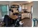 Cozy kitchen features white cabinets, butcher block countertops, and a hanging pot rack for easy cooking at 3422 Hillside Ave, Indianapolis, IN 46218
