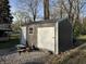 Large detached shed with an overhead garage door, providing ample storage for tools, equipment, or hobbies at 3422 Hillside Ave, Indianapolis, IN 46218