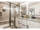 Bright bathroom featuring double sinks, quartz counters, and a tiled shower and tub at 3535 Buckner Dr, Westfield, IN 46074