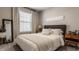 A serene bedroom with neutral colors and warm textures provides a relaxing retreat at 3535 Buckner Dr, Westfield, IN 46074