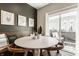 Cozy breakfast nook with a round table, bench seating, and access to the outdoor patio at 3535 Buckner Dr, Westfield, IN 46074