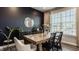 Elegant dining room with a wooden table, stylish chairs, and a modern light fixture at 3535 Buckner Dr, Westfield, IN 46074