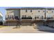 Townhome exterior featuring attached garages and outdoor balconies at 3535 Buckner Dr, Westfield, IN 46074