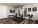 Well-equipped home gym with weights, workout equipment, and motivational decor at 3535 Buckner Dr, Westfield, IN 46074