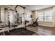 Bright home gym featuring an exercise bike, weight equipment, and natural light at 3535 Buckner Dr, Westfield, IN 46074