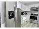 Clean kitchen with stainless steel refrigerator and modern appliances at 3618 Spann Ave, Indianapolis, IN 46203