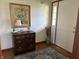 Classic foyer with hardwood floors, decorative chest, framed art, and a coat rack at 3760 Briar Hill Way, Columbus, IN 47203