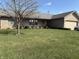 Charming single-story home with well-maintained lawn, attached garage, and neutral siding at 3760 Briar Hill Way, Columbus, IN 47203