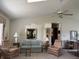 Bright living room features vaulted ceilings, comfortable seating, and natural light at 3760 Briar Hill Way, Columbus, IN 47203
