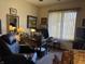 Well-appointed office with a large desk, comfortable seating, and ample natural light at 3760 Briar Hill Way, Columbus, IN 47203