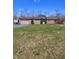 Charming brick ranch home with a large front yard and attached garage at 3922 Dundee Dr, Indianapolis, IN 46237