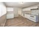 Bright kitchen showcasing light countertops and cabinets, and an open layout at 4008 N Mitthoefer Rd, Indianapolis, IN 46235