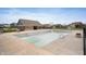 Community pool with empty pool, lounging area, and restroom near several homes at 4241 Risen Star Way, Bargersville, IN 46106