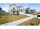 Charming two-story home with manicured lawn and inviting curb appeal in a friendly neighborhood at 4241 Risen Star Way, Bargersville, IN 46106