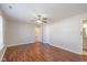 Bright bedroom featuring a ceiling fan, wood floors and neutral paint at 4655 Welton St, Greenwood, IN 46143