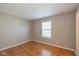 Cozy bedroom featuring a neutral color scheme and natural light from the window at 4655 Welton St, Greenwood, IN 46143
