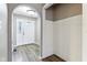 Inviting foyer featuring hardwood floors and a stylish archway to the rest of the home at 4911 Carry Back Ln, Indianapolis, IN 46237